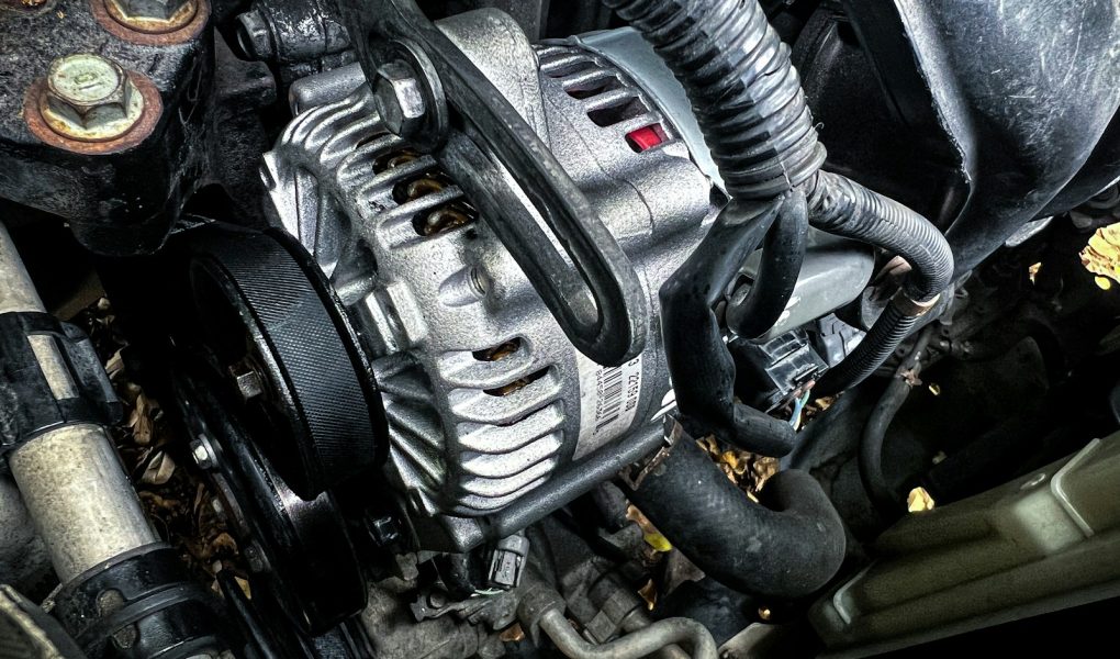 a car engine with a black hood